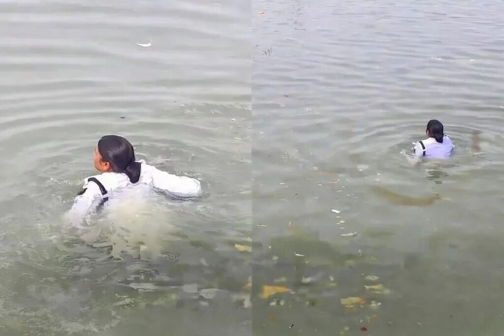 মানৱতাৰ অনন্য নিদৰ্শনঃ দুই যুৱকক উদ্ধাৰ কৰিবলৈ গংগাত জাপ মহিলা আৰক্ষীৰ, নিচিন্তিলে নিজৰ কথা 1 image