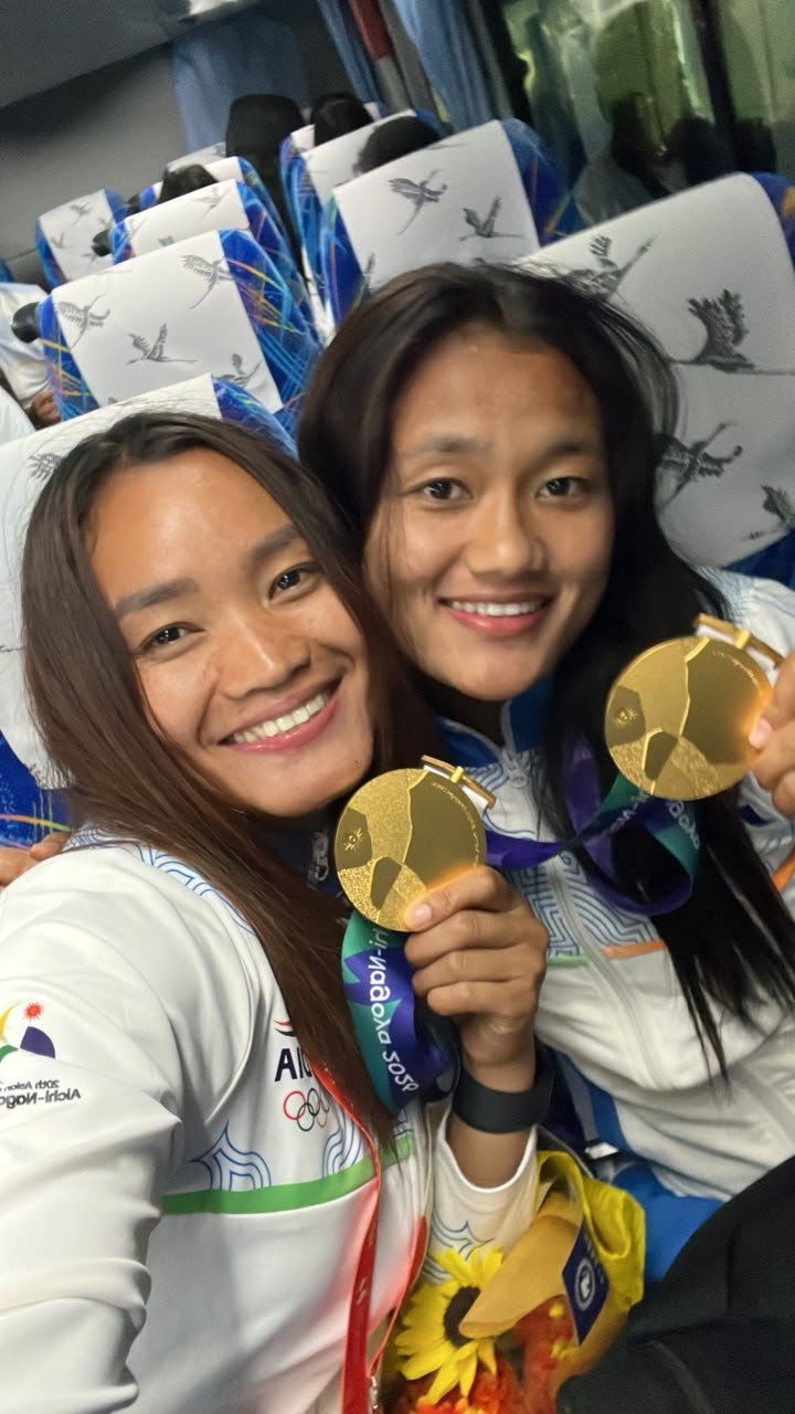 Mizoram Announces ₹25 Lakh Each for Hockey Gold Medallists Lalremsiami, Lalthantluangi 1 Lalremsiami and Lalthantluangi showing their Asian Games gold medals