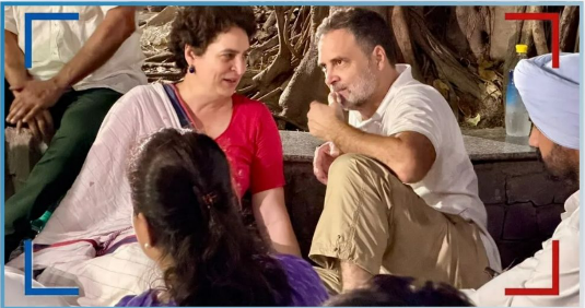 আকাশবাণী ভৱনত বলপূৰ্বক প্ৰৱেশৰ অভিযোগ; ৰাহুল গান্ধী আৰু প্ৰিয়ংকা গান্ধীৰ বিৰুদ্ধে দিল্লী আৰক্ষীক এজাহাৰ দাখিল কৰ্মচাৰীৰ 1 ৰাহুল গান্ধী আৰু প্ৰিয়ংকা গান্ধী ভাদ্ৰা আন লোকৰ সৈতে গছৰ তলত বহি থকা দৃশ্য।